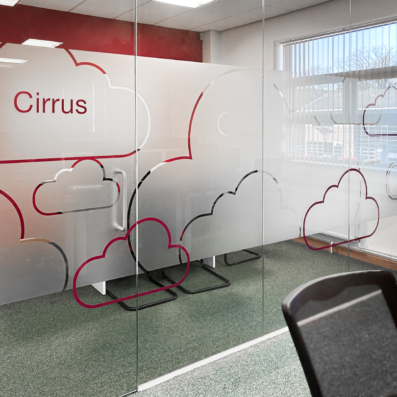 NoBlue Nottingham Office glass wall with a door for a meeting room.