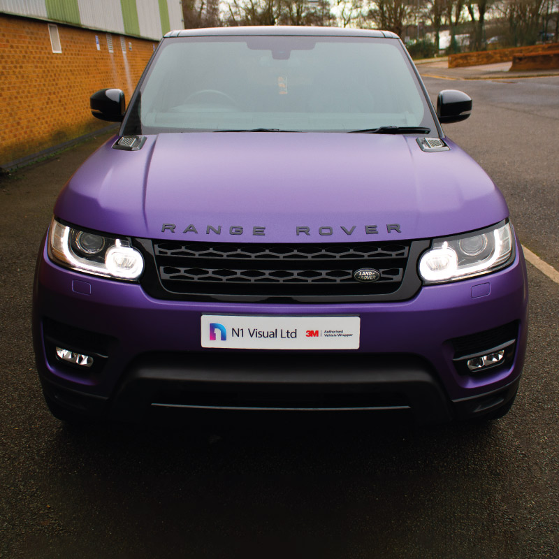Front view of a Range Rover wrapped in Satin Metallic Purple